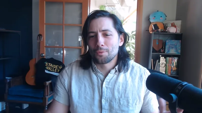 ConcernedApe at his desk during a dev update — the solo developer behind every patch